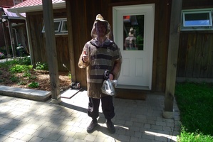 Joey stays protected from bugs while working on the path project