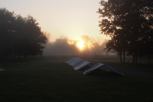 Dawn rises on the canopies, which will be used to cover the food distribution tables