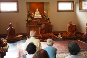Luang Por Liem speaks to bhikkhus and laity soon after his arrival at Tisarana