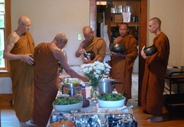 Bhikkhus collect almsfood