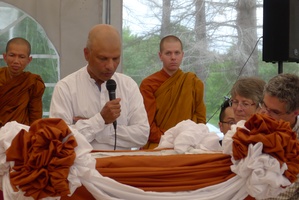 Nalaka reads the English script on the stone to be embedded in the upcoming meditation hall