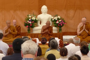 Monastics chant blessings at the ceremony for the upcoming meditation hall