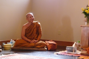 Luang Por Jundee sits in the Kusala Sala soon after his arrival with Luang Por Liem