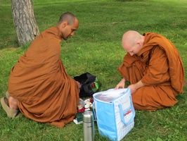 Vens. Atulo and Sallekho prepare offerings during a trip to the arboretum in Ottawa