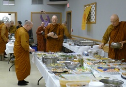 Senior monks request alms