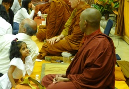 A young Buddhist speaks with Bhant Vijita