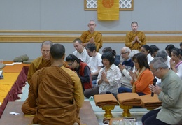 Ambassador Pisan dedicates cloth offerings to the Sangha