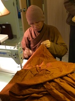 Tan Suvijjano at work on the kathina robe