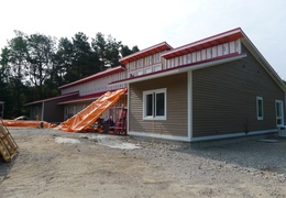 The siding is coming up (facing southeast)