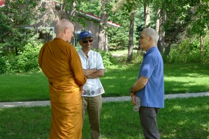 Ven Khemako chats with Nalaka and Crawford during Vassa Aradhana