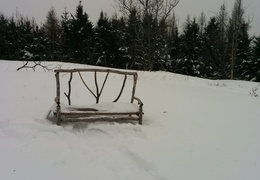 The bench still offers a place to sit even in the winter