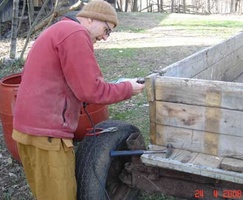 Ajahn Kusalo works on new wagon for the monastery