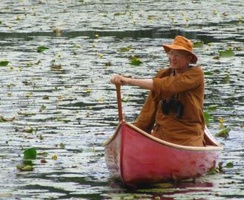 Ajahn Viradhammo takes a canoe on the pond