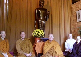 Monastics in front of the standing Buddha.  L to R: Bhante Khemaratana, Ajahn Kusalo, Ajahn Viradhammo, Ayya Medhanandi, Anagarika Cathy