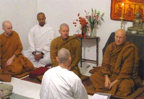 Anagarika Laurence in front of the monastic community