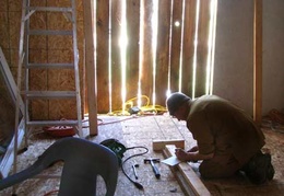 Ajahn Kusalo gets to work on the new barn lobby shrine