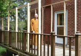 The porch is getting framed in.  A roof will be put on in preparation for Luang Por Sumedho's upcoming visit.
