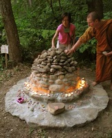 Ajahn Kusalo builds a stupa with the kids at IMS