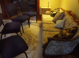 It looks like a showdown between the chairs and the couch
