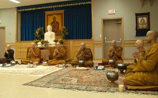 The Sangha gives blessing at Ven. Atulo's bhikkhu ordination