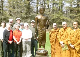 Another group photo next to the standing Buddha