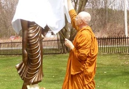 Ajahn Viradhammo unveils the new location of the standing Buddha