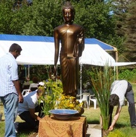 Ajahn Viradhammo asked for the Budda to be set up outside for his birthday