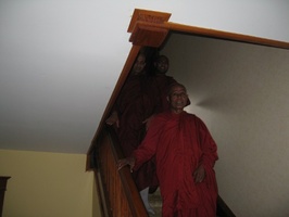 Bhante Gunaratana returns from a tour of the upstairs of the house