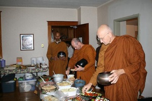 The Sangha collects alms