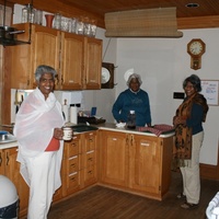 The three sisters take care of things in the kitchen. L to R: Priyani, Anoma, and Harini