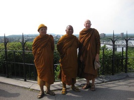The Luang Pors in front of a view of Quebec