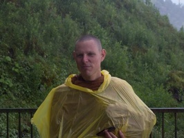 Tan Thaniyo with raincoat
