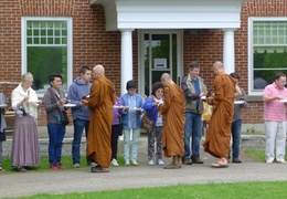 Another photo of the senior monks collecting alms