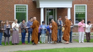 Another photo of the senior monks collecting alms