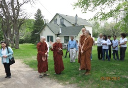 The bhikkhunis chat with Tan Ajahn Dtun and Ajahn Tejapanyo