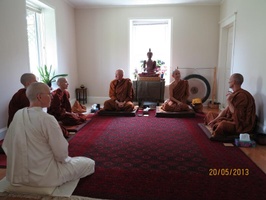 The bhikkhus and bhikkhunis assemble in Satisaraniya's shrine room