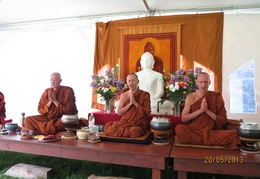 The senior monks chanting the meal blessing