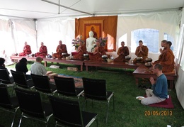 The Sangha chants the meal blessing on Vesak