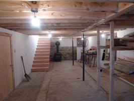 The stairs leading to the second floor of the new workshop